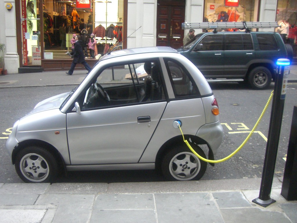 Electric car charging point at a station