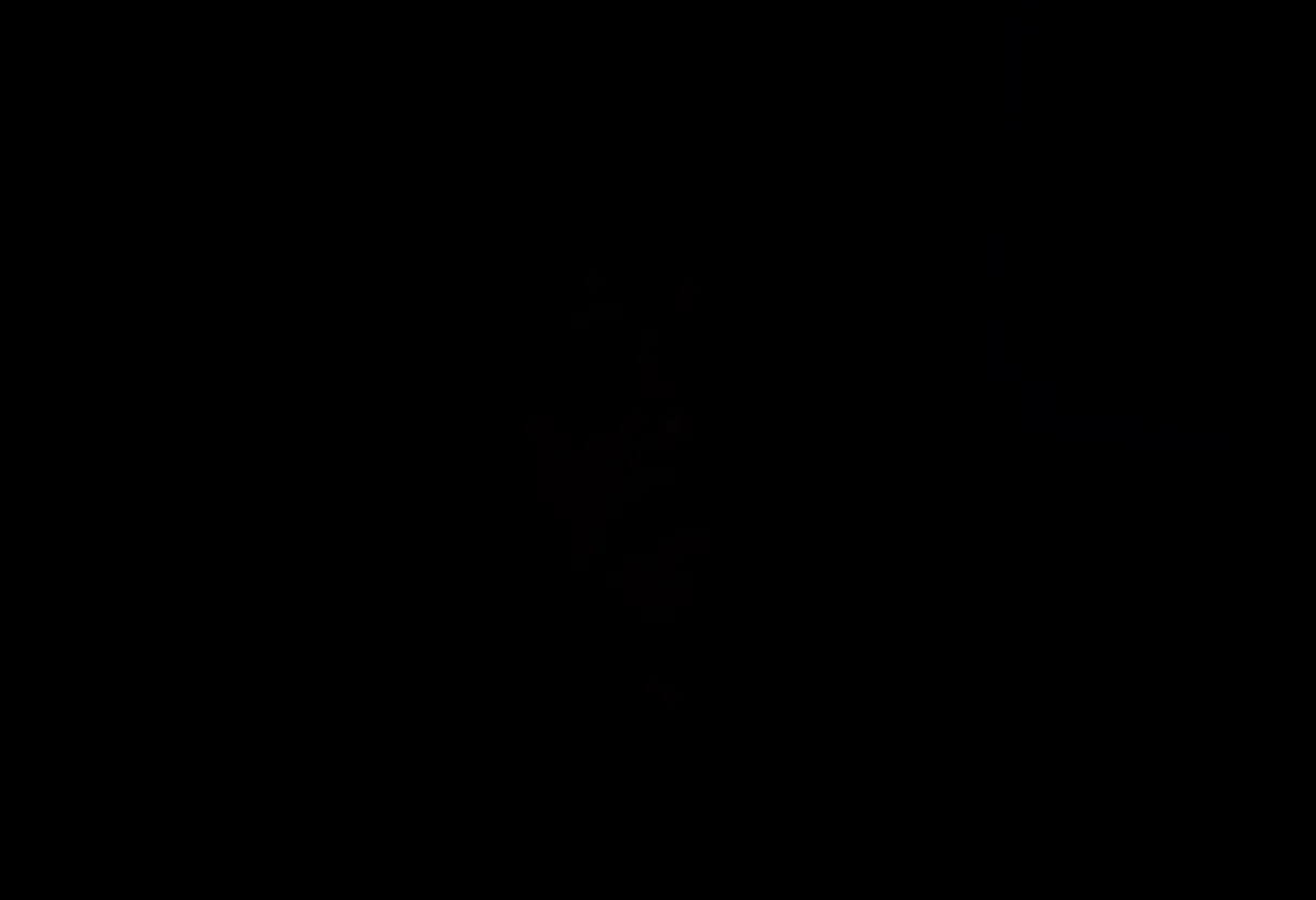 A smartphone screen glowing in a dark room